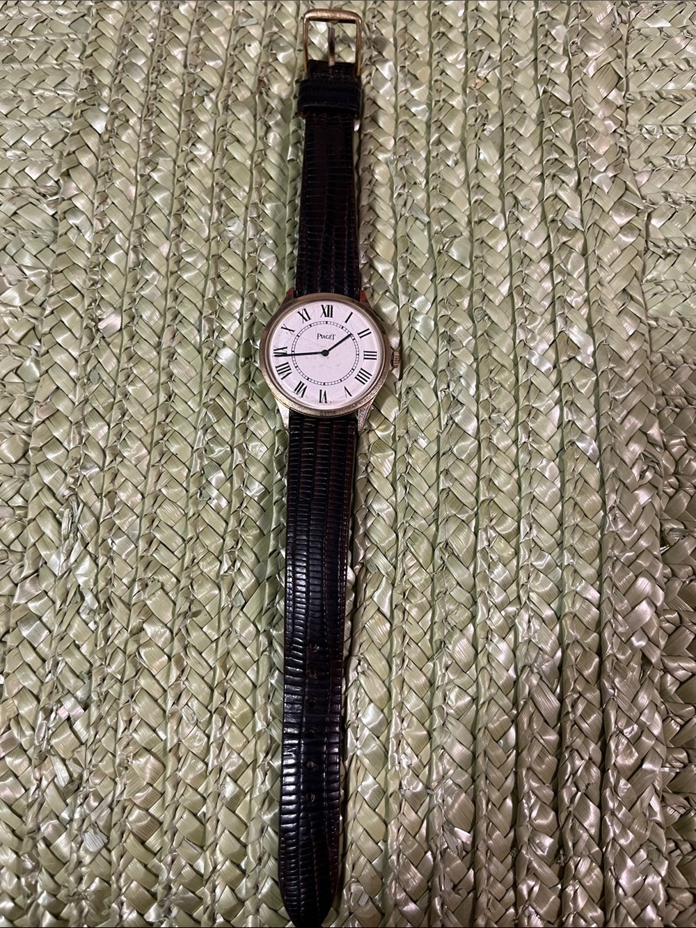 Piaget Silver Case Watch with Black Leather Strap and White Dial